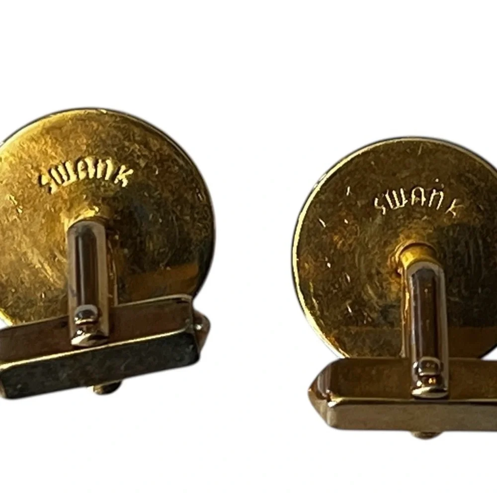 SWANK Gold and Silver Skull Earrings